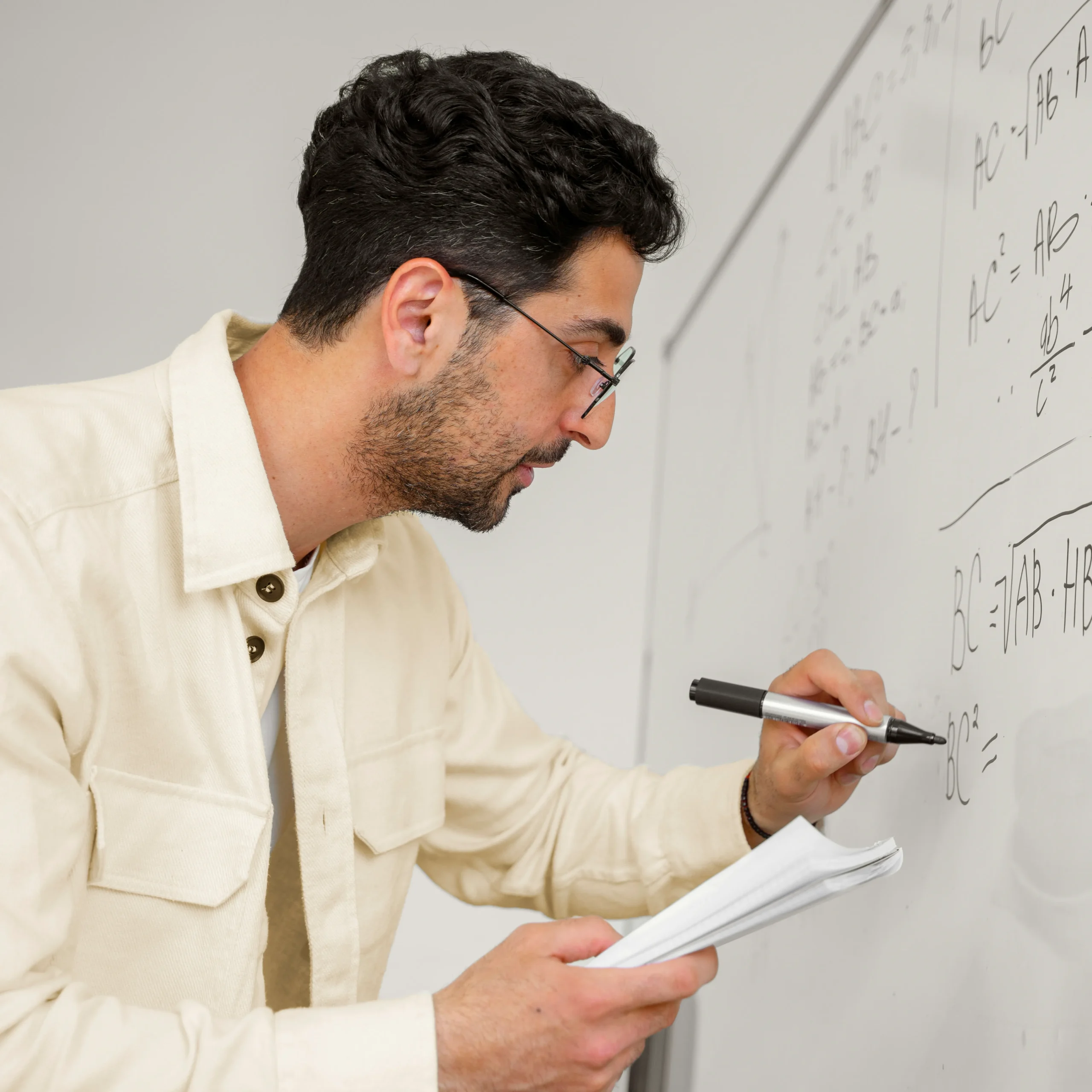 High-skilled foreign teacher conducting classroom instruction, compliant with international education recruitment, qualification, and ethical teaching standards.